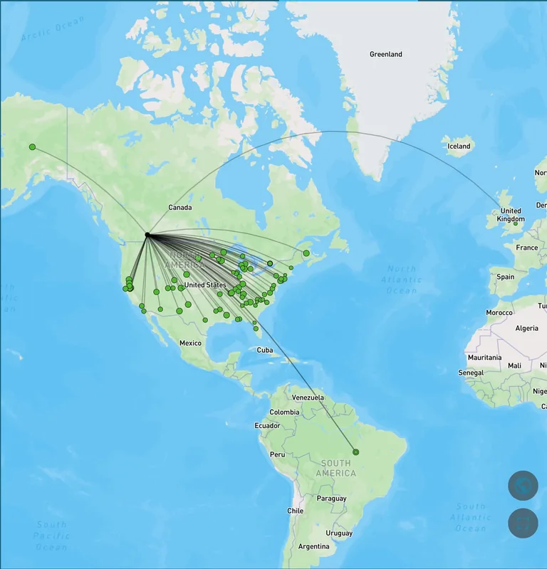A world map of radio contacts made from one portable station, with lines reaching across North America and to Europe and South America.